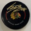 Connor Bedard Signed Hockey Puck - ROOKIE AUTHENTICATION (gold ink)